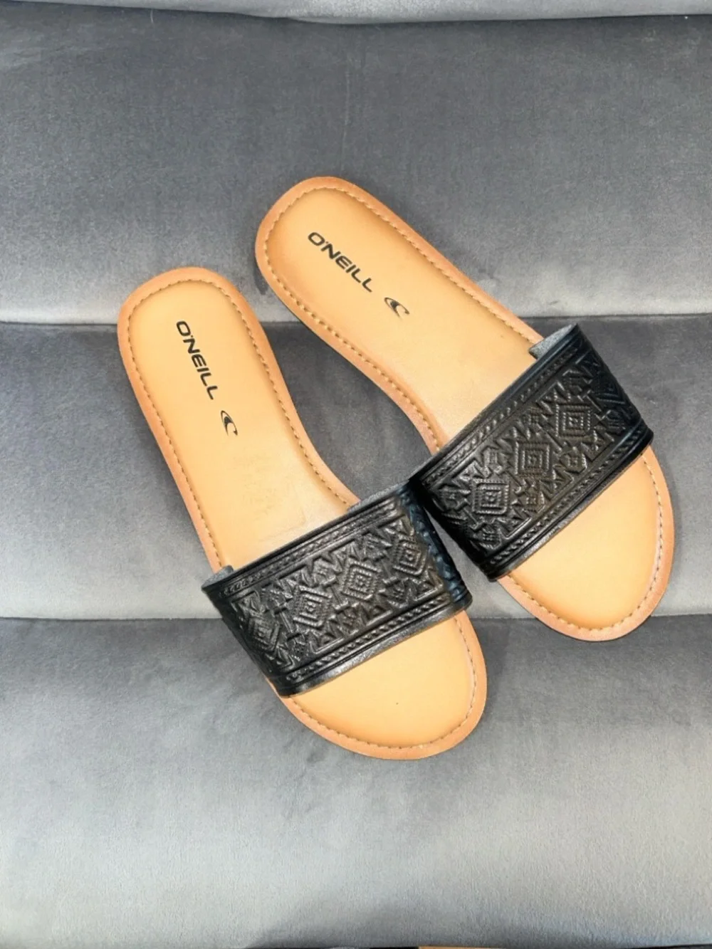 O'Neill Women's Black Embossed Slide Sandals with Tan Footbed